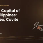 Caffeine Brothers featured image: Coffee Capital of the Philippines: Amadeo, Cavite, with a map pin above a coffee branch with red cherries