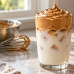 Dalgona coffee recipe: whipped coffee foam over a glass of milk